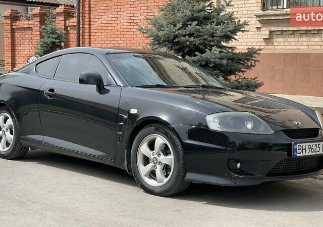 Чорний Хендай Купе, об'ємом двигуна 1.98 л та пробігом 175 тис. км за 4800 $, фото 1 на Automoto.ua