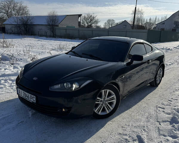 Черный Хендай Купе, объемом двигателя 1.98 л и пробегом 235 тыс. км за 5200 $, фото 1 на Automoto.ua