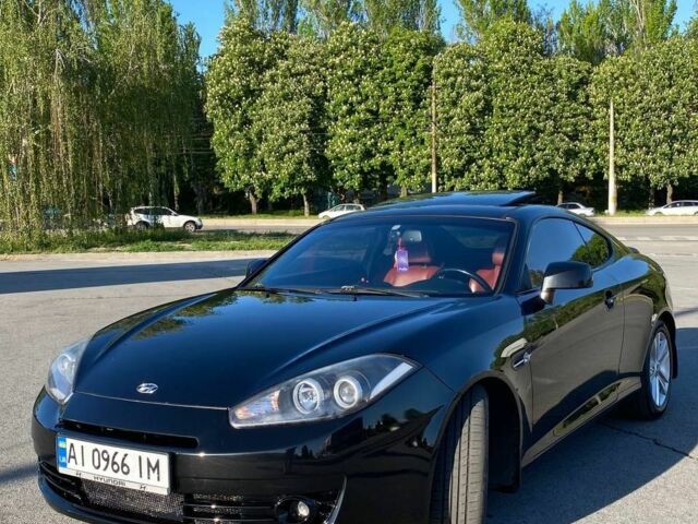 Черный Хендай Купе, объемом двигателя 2 л и пробегом 186 тыс. км за 6500 $, фото 1 на Automoto.ua