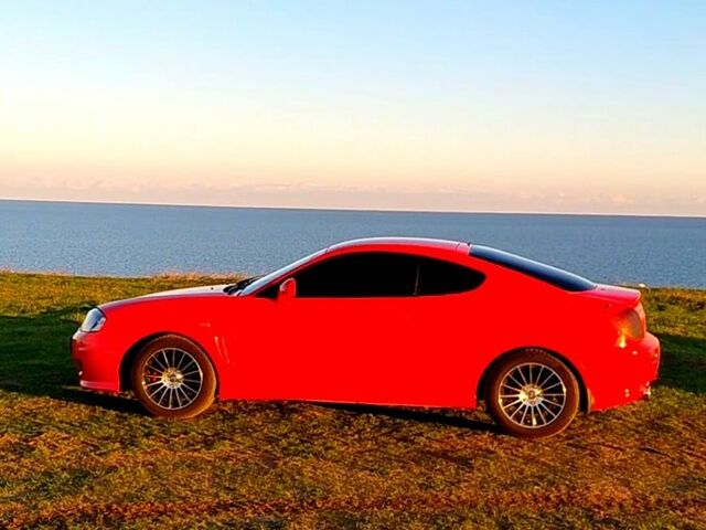 Червоний Хендай Купе, об'ємом двигуна 2 л та пробігом 240 тис. км за 4500 $, фото 1 на Automoto.ua