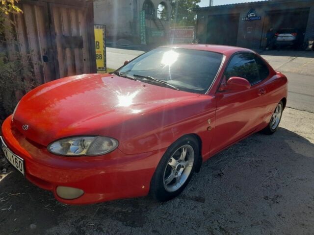 Красный Хендай Купе, объемом двигателя 2 л и пробегом 258 тыс. км за 1700 $, фото 1 на Automoto.ua