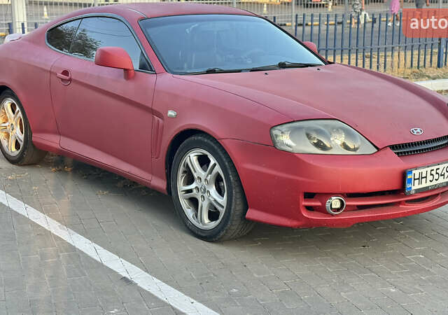 Красный Хендай Купе, объемом двигателя 1.6 л и пробегом 173 тыс. км за 4000 $, фото 1 на Automoto.ua