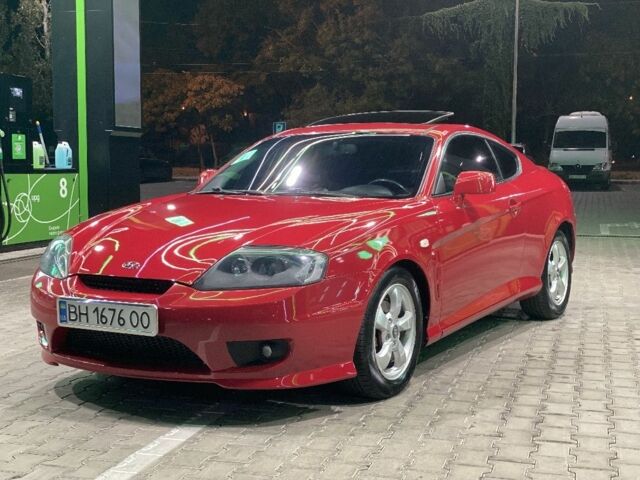 Красный Хендай Купе, объемом двигателя 2 л и пробегом 230 тыс. км за 5280 $, фото 1 на Automoto.ua