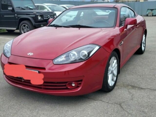Червоний Хендай Купе, об'ємом двигуна 2 л та пробігом 219 тис. км за 2900 $, фото 1 на Automoto.ua