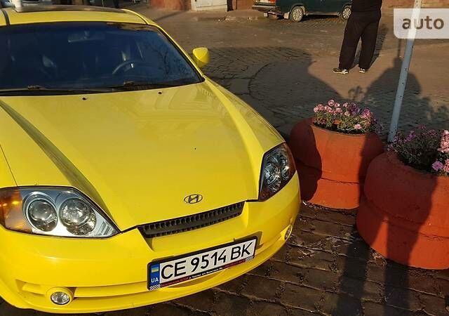 Желтый Хендай Купе, объемом двигателя 1.98 л и пробегом 194 тыс. км за 3400 $, фото 1 на Automoto.ua