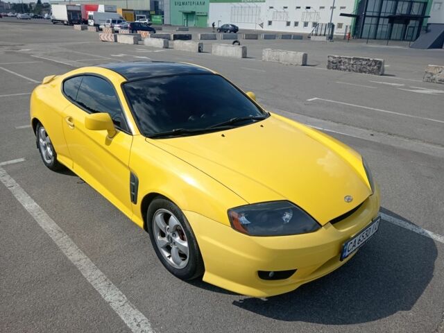 Желтый Хендай Купе, объемом двигателя 2 л и пробегом 200 тыс. км за 3900 $, фото 1 на Automoto.ua