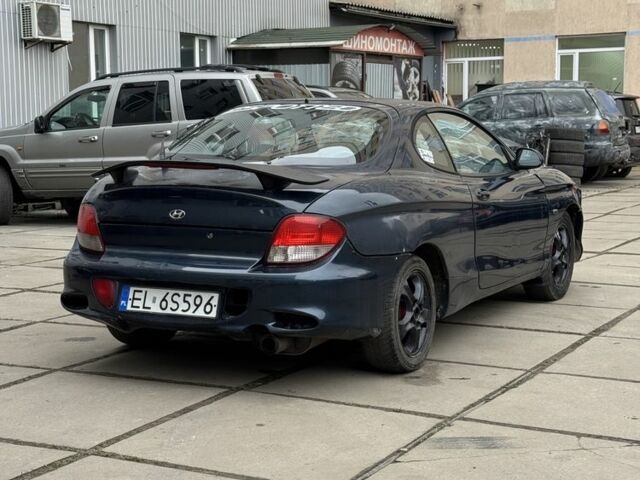 Синий Хендай Купе, объемом двигателя 1.6 л и пробегом 215 тыс. км за 900 $, фото 1 на Automoto.ua