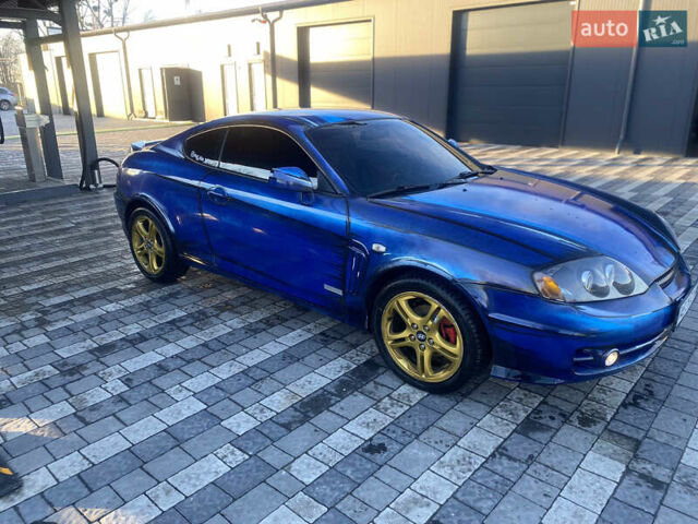 Синий Хендай Купе, объемом двигателя 2 л и пробегом 232 тыс. км за 4800 $, фото 1 на Automoto.ua