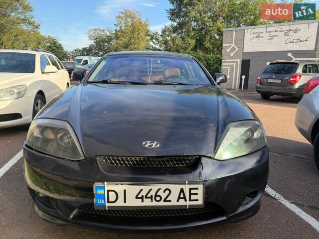 Синий Хендай Купе, объемом двигателя 1.98 л и пробегом 234 тыс. км за 3400 $, фото 1 на Automoto.ua