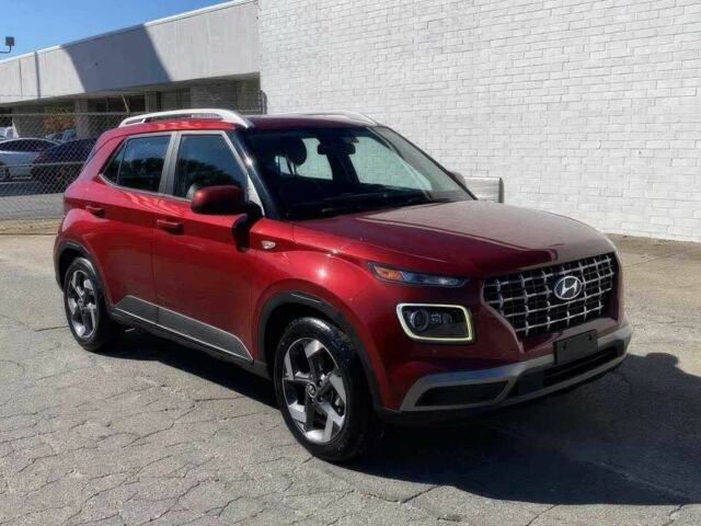 Красный Хендай Другая, объемом двигателя 1.6 л и пробегом 14 тыс. км за 12000 $, фото 1 на Automoto.ua