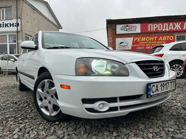 Белый Хендай Элантра, объемом двигателя 2 л и пробегом 193 тыс. км за 4200 $, фото 1 на Automoto.ua