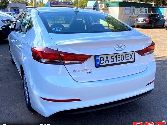 Белый Хендай Элантра, объемом двигателя 2 л и пробегом 60 тыс. км за 12800 $, фото 1 на Automoto.ua