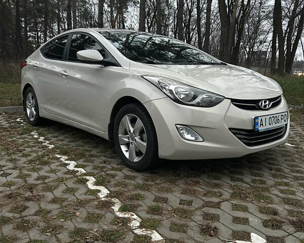 Бежевий Хендай Елантра, об'ємом двигуна 1.8 л та пробігом 131 тис. км за 9900 $, фото 1 на Automoto.ua