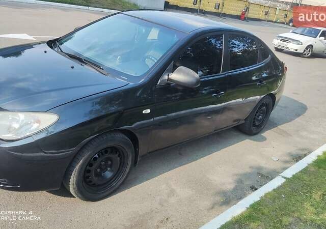 Черный Хендай Элантра, объемом двигателя 1.59 л и пробегом 280 тыс. км за 4500 $, фото 1 на Automoto.ua