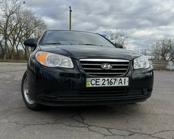 Черный Хендай Элантра, объемом двигателя 1.59 л и пробегом 264 тыс. км за 5800 $, фото 1 на Automoto.ua