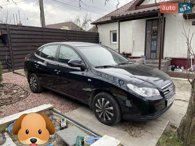 Черный Хендай Элантра, объемом двигателя 1.6 л и пробегом 165 тыс. км за 5800 $, фото 1 на Automoto.ua