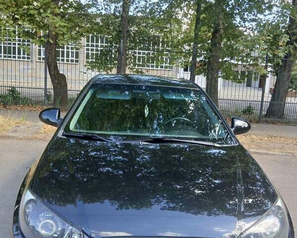 Черный Хендай Элантра, объемом двигателя 1.59 л и пробегом 193 тыс. км за 7000 $, фото 1 на Automoto.ua