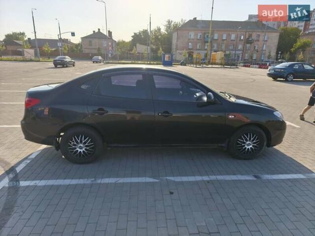 Черный Хендай Элантра, объемом двигателя 1.59 л и пробегом 213 тыс. км за 5300 $, фото 1 на Automoto.ua