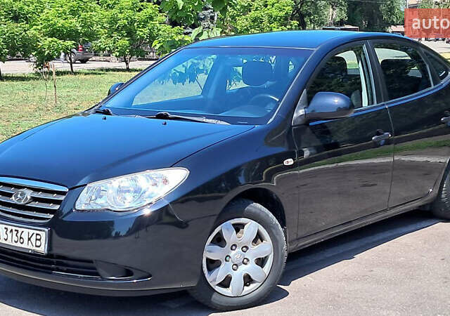 Черный Хендай Элантра, объемом двигателя 1.6 л и пробегом 250 тыс. км за 7000 $, фото 1 на Automoto.ua