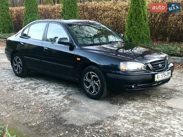 Чорний Хендай Елантра, об'ємом двигуна 1.6 л та пробігом 66 тис. км за 6000 $, фото 1 на Automoto.ua