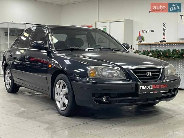 Черный Хендай Элантра, объемом двигателя 1.6 л и пробегом 146 тыс. км за 5890 $, фото 1 на Automoto.ua