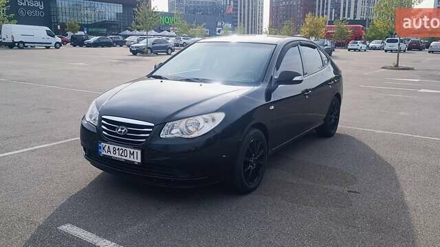 Черный Хендай Элантра, объемом двигателя 1.59 л и пробегом 213 тыс. км за 5500 $, фото 1 на Automoto.ua