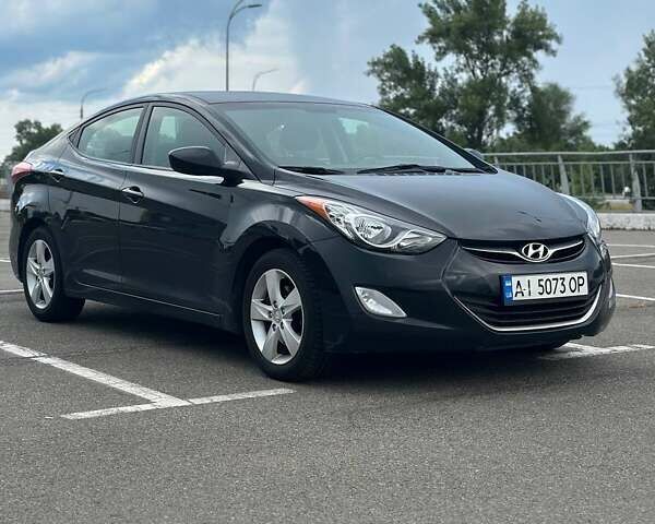 Черный Хендай Элантра, объемом двигателя 1.8 л и пробегом 210 тыс. км за 7599 $, фото 1 на Automoto.ua