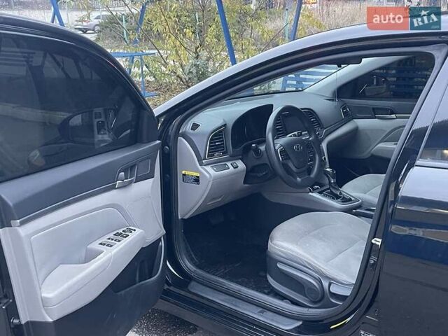 Черный Хендай Элантра, объемом двигателя 2 л и пробегом 232 тыс. км за 9200 $, фото 1 на Automoto.ua