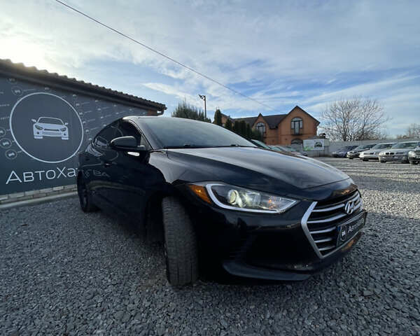 Чорний Хендай Елантра, об'ємом двигуна 2 л та пробігом 233 тис. км за 11800 $, фото 1 на Automoto.ua