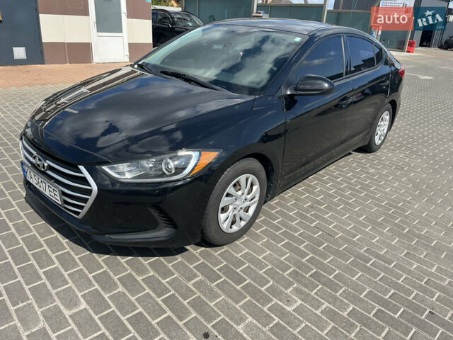 Черный Хендай Элантра, объемом двигателя 2 л и пробегом 185 тыс. км за 8999 $, фото 1 на Automoto.ua