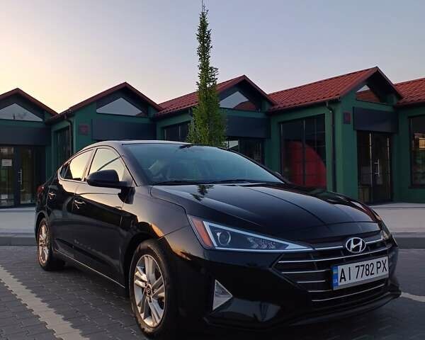 Черный Хендай Элантра, объемом двигателя 2 л и пробегом 86 тыс. км за 12900 $, фото 1 на Automoto.ua
