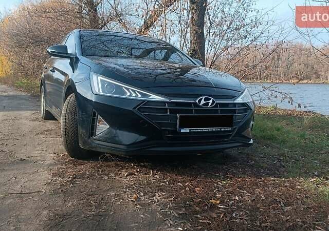 Черный Хендай Элантра, объемом двигателя 1.59 л и пробегом 98 тыс. км за 13800 $, фото 1 на Automoto.ua