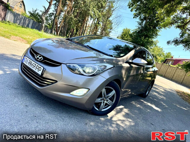 Коричневый Хендай Элантра, объемом двигателя 1.8 л и пробегом 214 тыс. км за 8890 $, фото 1 на Automoto.ua