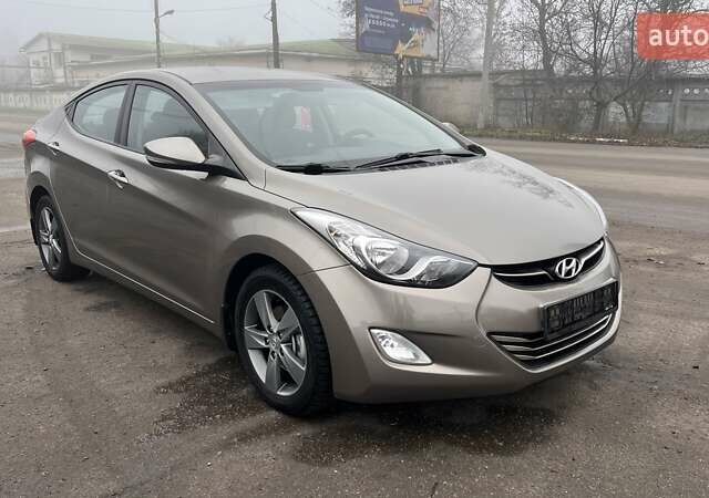 Коричневый Хендай Элантра, объемом двигателя 1.8 л и пробегом 107 тыс. км за 9800 $, фото 1 на Automoto.ua