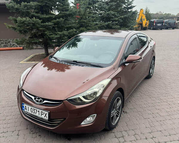 Коричневый Хендай Элантра, объемом двигателя 1.8 л и пробегом 268 тыс. км за 7800 $, фото 1 на Automoto.ua