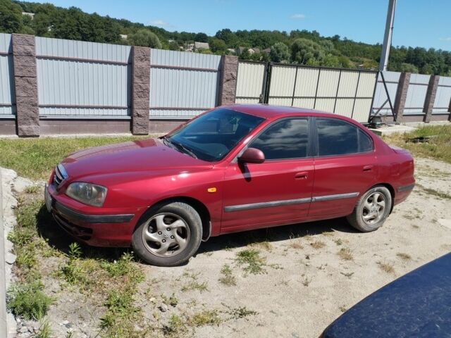Червоний Хендай Елантра, об'ємом двигуна 2 л та пробігом 466 тис. км за 2700 $, фото 1 на Automoto.ua