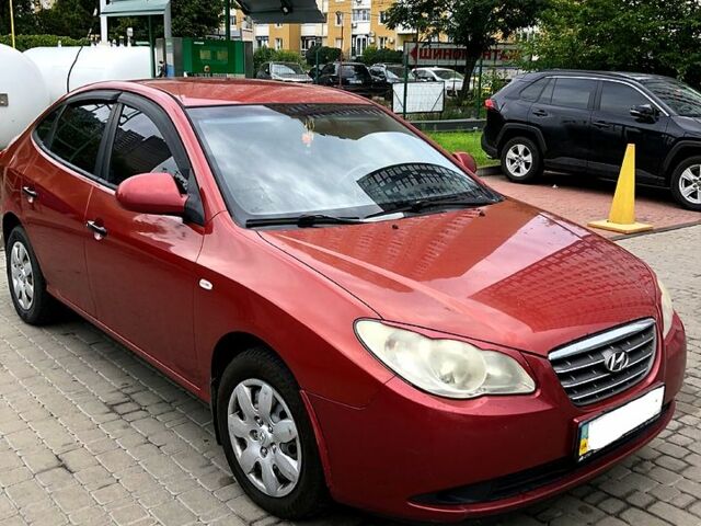 Красный Хендай Элантра, объемом двигателя 1.6 л и пробегом 260 тыс. км за 5999 $, фото 1 на Automoto.ua
