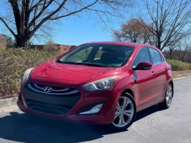 Красный Хендай Элантра, объемом двигателя 2 л и пробегом 88 тыс. км за 13550 $, фото 1 на Automoto.ua