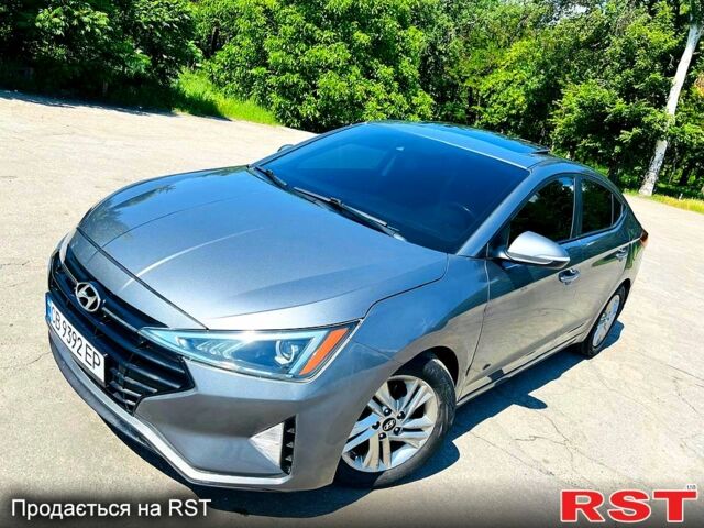 Сірий Хендай Елантра, об'ємом двигуна 2 л та пробігом 106 тис. км за 11999 $, фото 1 на Automoto.ua