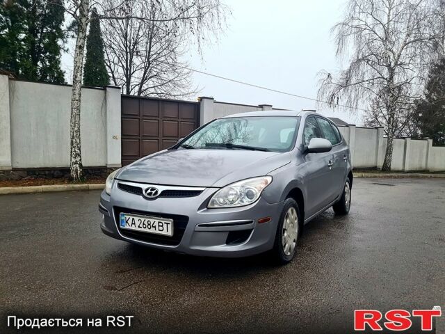 Сірий Хендай Елантра, об'ємом двигуна 2 л та пробігом 250 тис. км за 4750 $, фото 1 на Automoto.ua