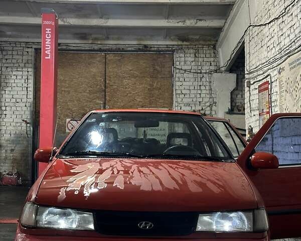 Червоний Хендай Ексель, об'ємом двигуна 1.5 л та пробігом 410 тис. км за 1100 $, фото 1 на Automoto.ua