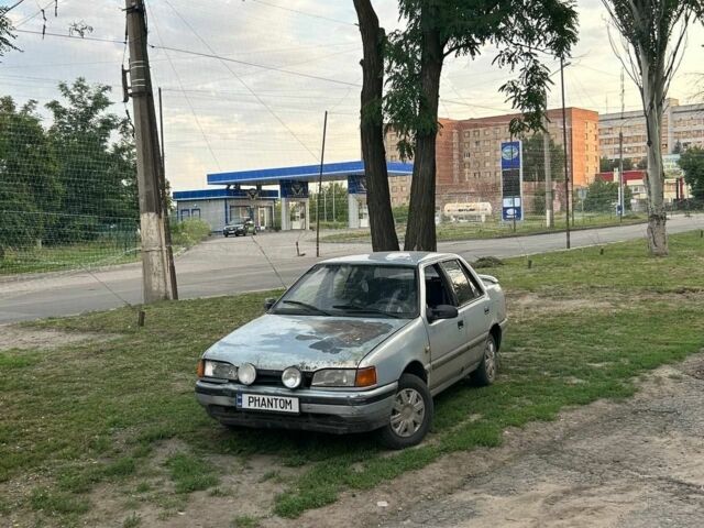 Серый Хендай Ексель, объемом двигателя 1.5 л и пробегом 250 тыс. км за 382 $, фото 1 на Automoto.ua
