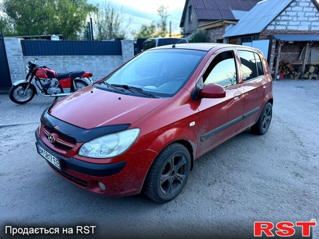 Красный Хендай Гетц, объемом двигателя 1.4 л и пробегом 150 тыс. км за 3500 $, фото 1 на Automoto.ua