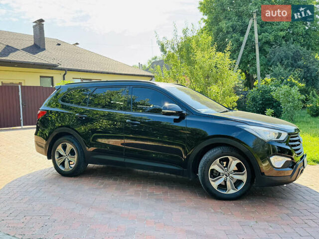 Черный Хендай Гранд Санта Фе, объемом двигателя 2.2 л и пробегом 95 тыс. км за 19800 $, фото 1 на Automoto.ua