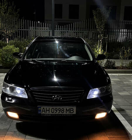 Черный Хендай Грандер, объемом двигателя 3.3 л и пробегом 230 тыс. км за 8500 $, фото 1 на Automoto.ua