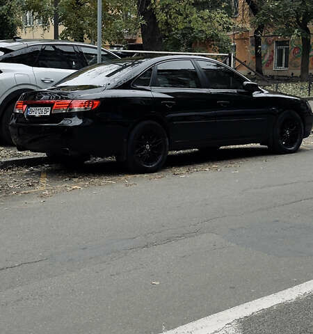 Черный Хендай Грандер, объемом двигателя 3.3 л и пробегом 165 тыс. км за 7990 $, фото 1 на Automoto.ua