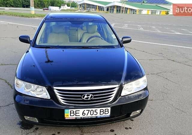 Черный Хендай Грандер, объемом двигателя 3.34 л и пробегом 198 тыс. км за 8500 $, фото 1 на Automoto.ua