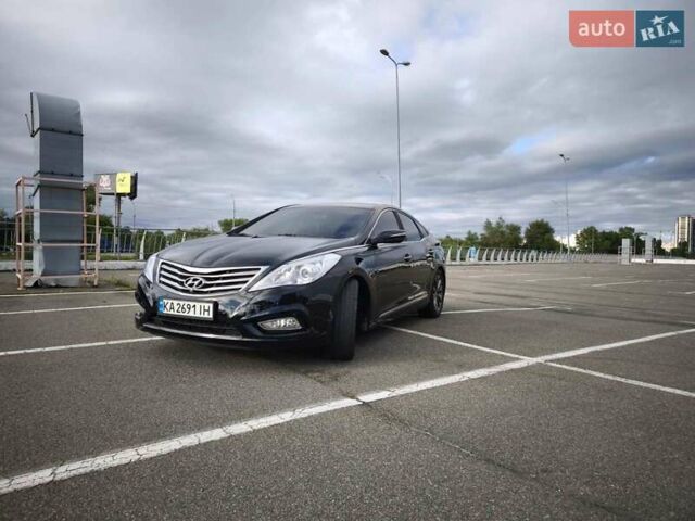 Черный Хендай Грандер, объемом двигателя 3 л и пробегом 252 тыс. км за 10500 $, фото 1 на Automoto.ua