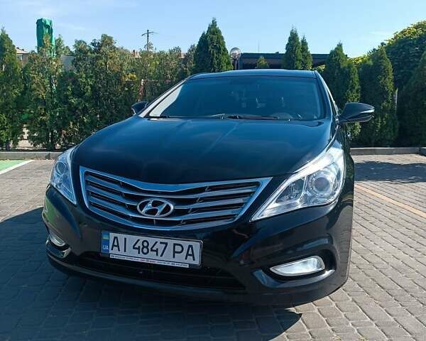 Чорний Хендай Грандер, об'ємом двигуна 3 л та пробігом 170 тис. км за 12500 $, фото 1 на Automoto.ua