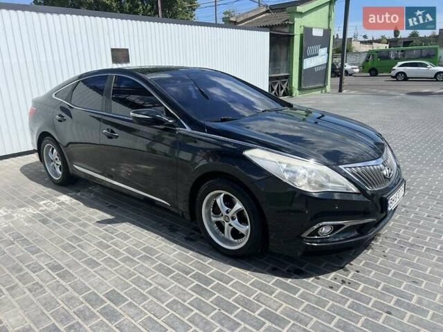 Черный Хендай Грандер, объемом двигателя 3 л и пробегом 148 тыс. км за 11000 $, фото 1 на Automoto.ua